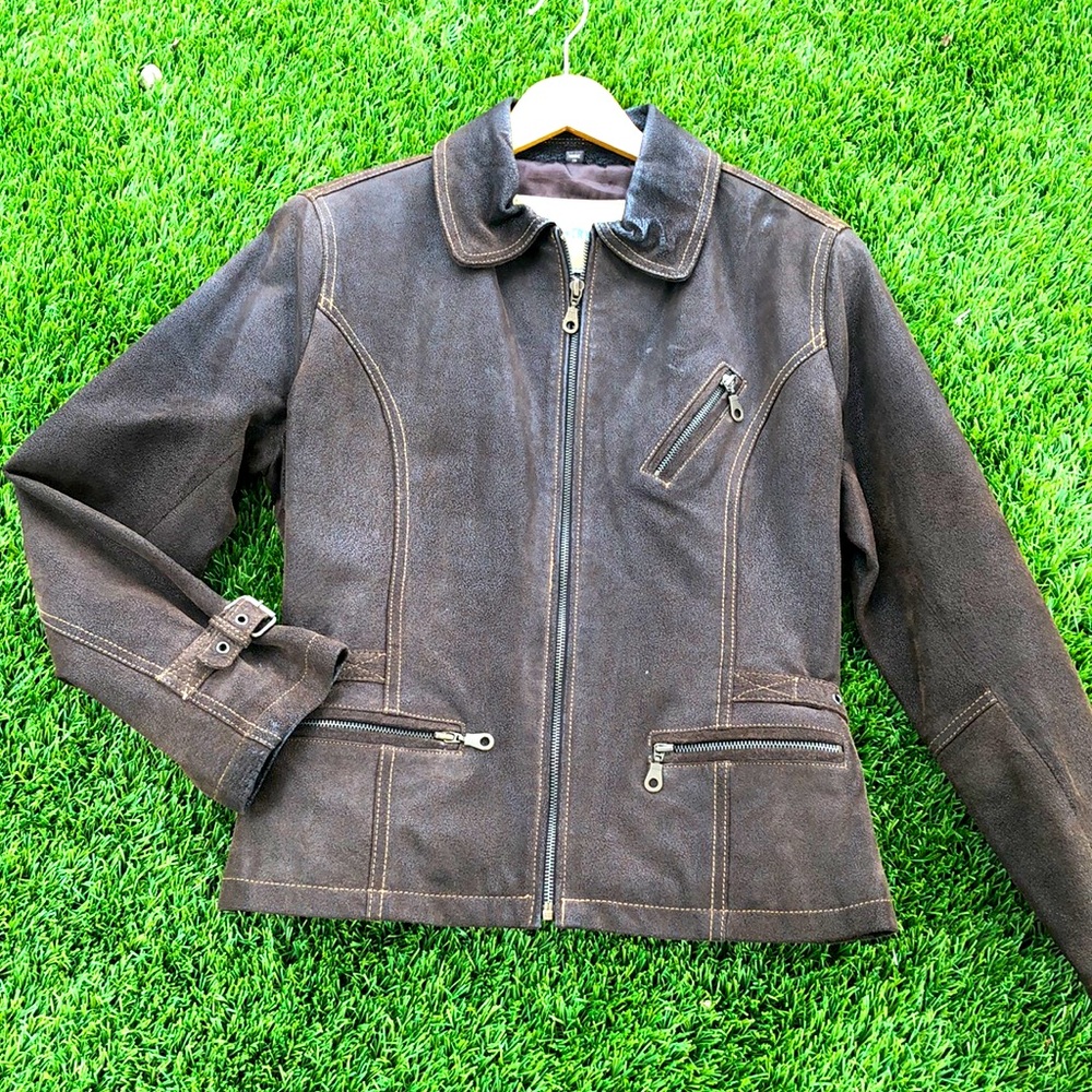 Vintage leather jacket. Fully lined, no rips or holes. Worn and retro!